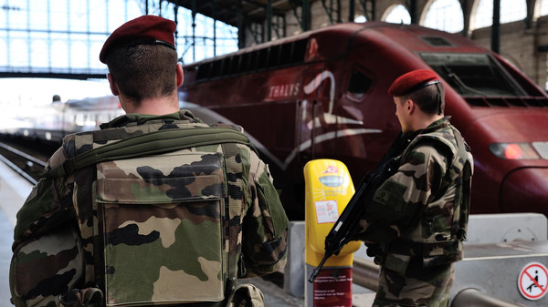 French soldiers patrol at Gare du Nord train station in Paris, France, Saturday, Aug. 22, 2015. (AP) 