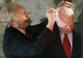 American Senator Joe Lieberman puts a yarmulke on the head of former presidential candidate senator John McCain