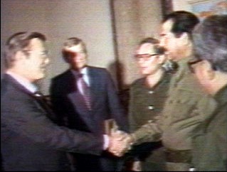 Rumsfeld shaking hands with Saddam Hussein. It looks like he has switched sides too! 