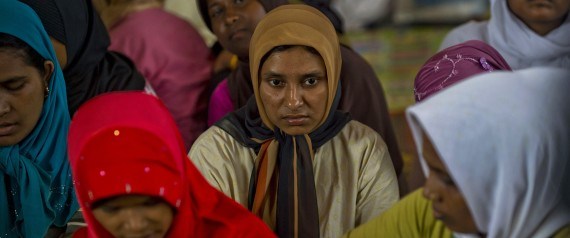 Rescued Rohingya women from Myanmar register for an Indonesian police identification process at the confinement area in the fishing port of Kuala Langsa in Aceh province on May 18, 2015 where hundreds of migrants from Myanmar and Bangladesh are taking temporary shelter after they were rescued by Indonesian fishermen. Nearly 3,000 migrants have swum to shore or been rescued off Indonesia, Malaysia and Thailand over the past week, around half of whom have arrived in Indonesia's western province of Aceh. AFP PHOTO / ROMEO GACAD        (Photo credit should read ROMEO GACAD/AFP/Getty Images)