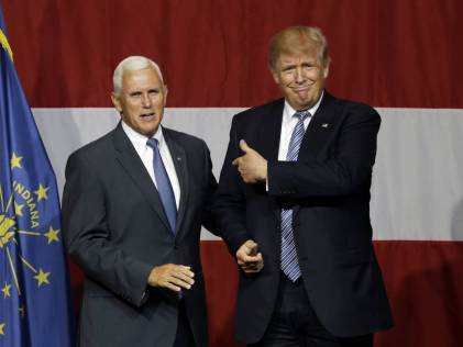 Indiana Gov. Mike Pence joins Republican presidential candidate Donald Trump at a rally in Westfield, Ind., Tuesday, July 12, 2016. (AP Photo/Michael Conroy)